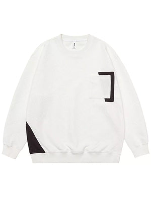 White crew neck sweatshirt with textured pattern, chest pocket, and black accents