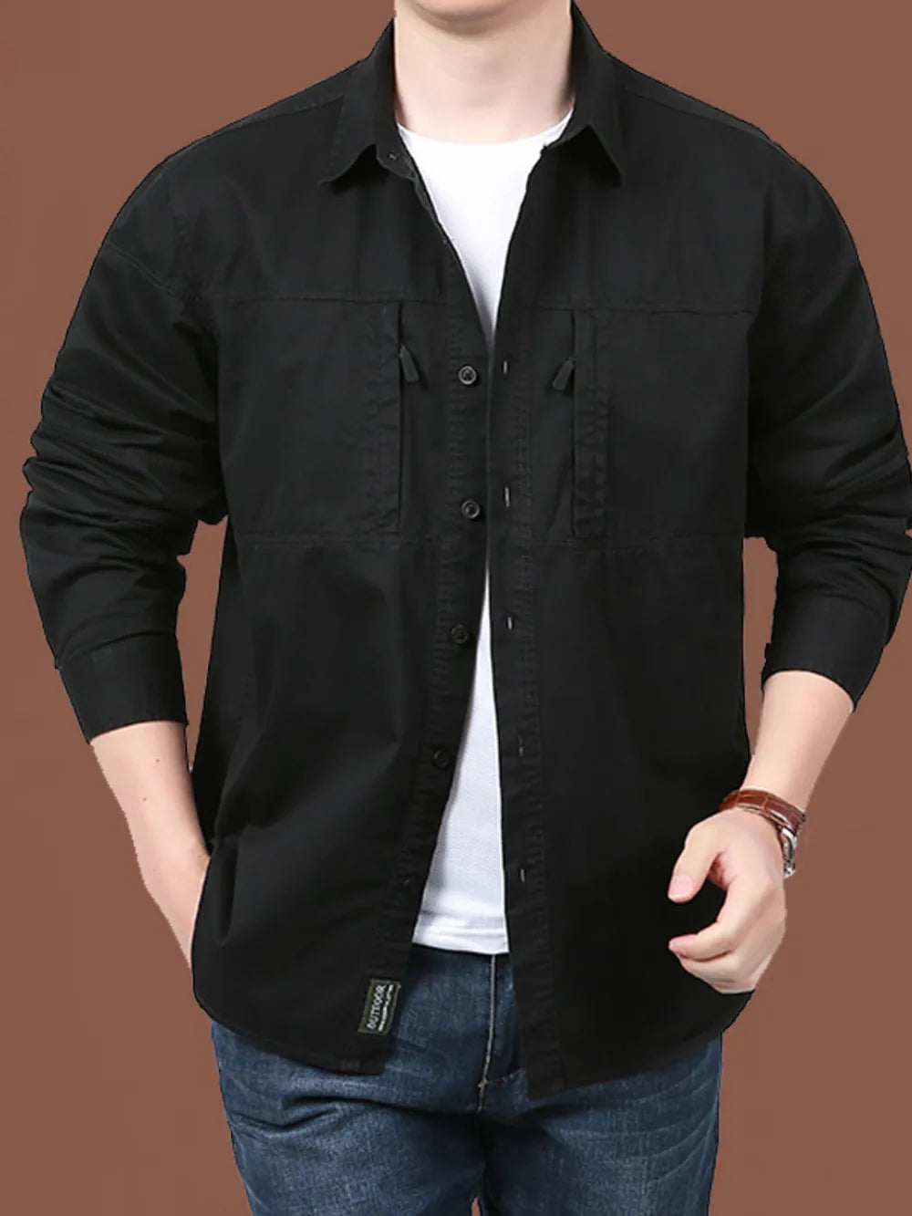 Men's black cotton relaxed fit button-front shirt with dual chest pockets.