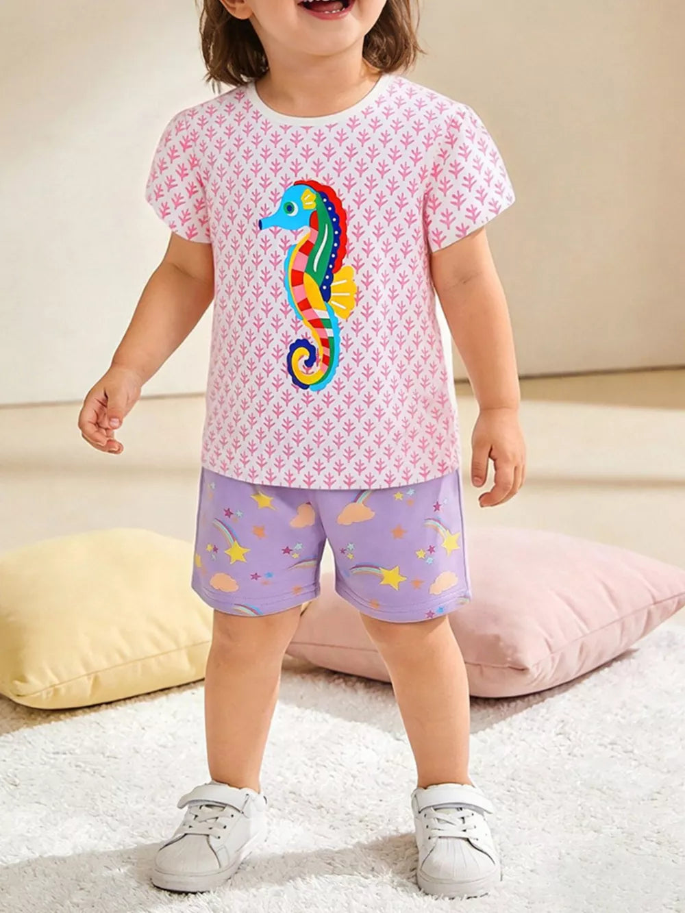 Toddler tee and shorts set with seahorse graphic and cloud/star print.
