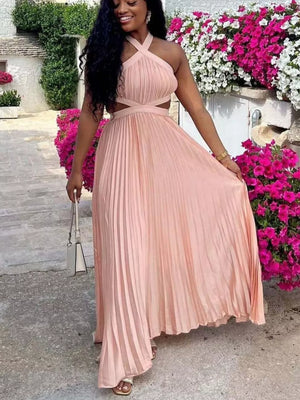 Peach pleated maxi dress with cutout detail and halter neckline.