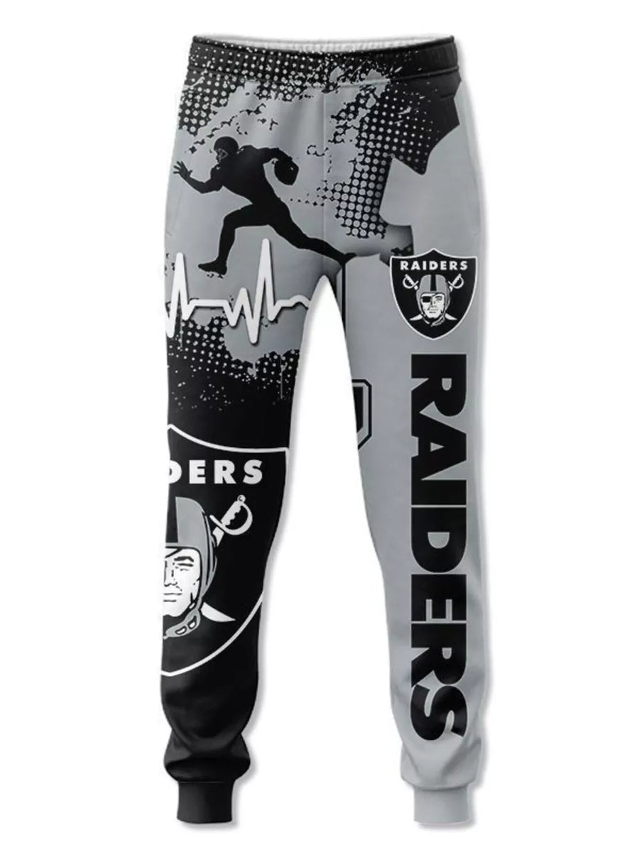 Las Vegas Raiders graphic print sweatpants with football player and logo.