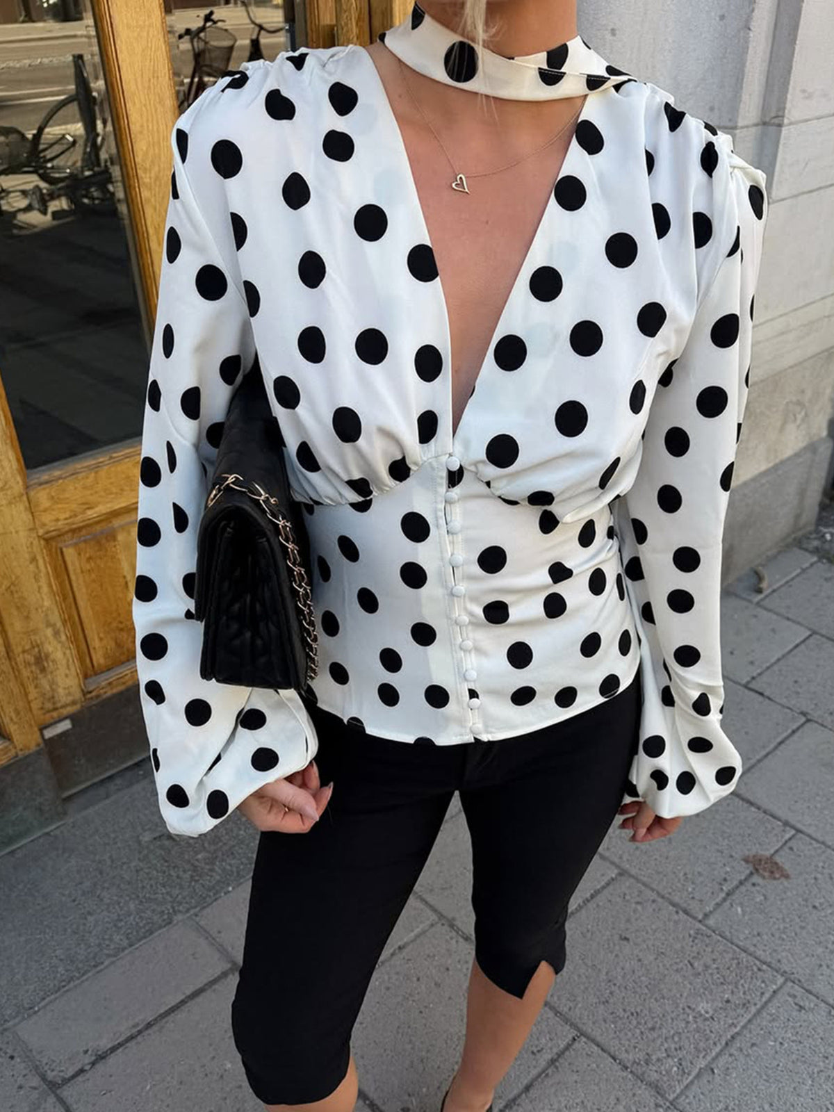 ivory blouse with polka dot and deep v-neck