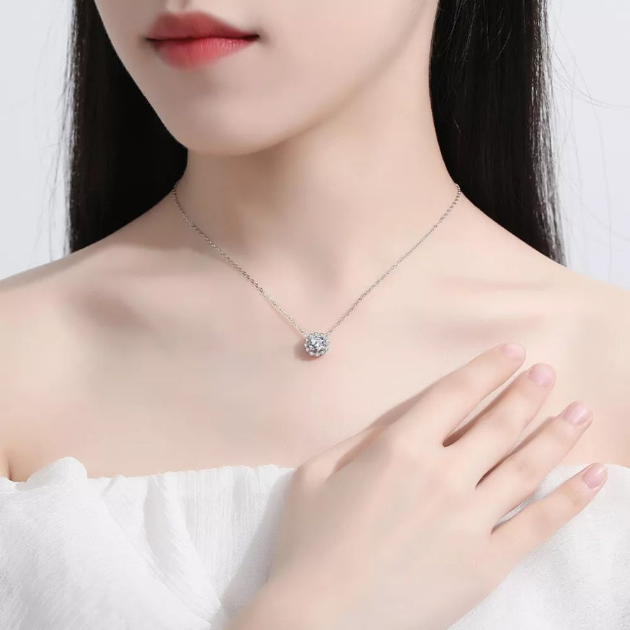 necklace in clear with floral and flower pendant