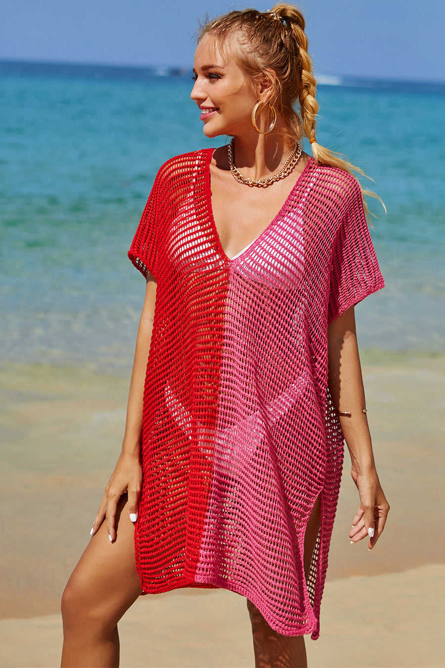 Red and pink ombre crochet beach cover-up with V-neck and short sleeves.