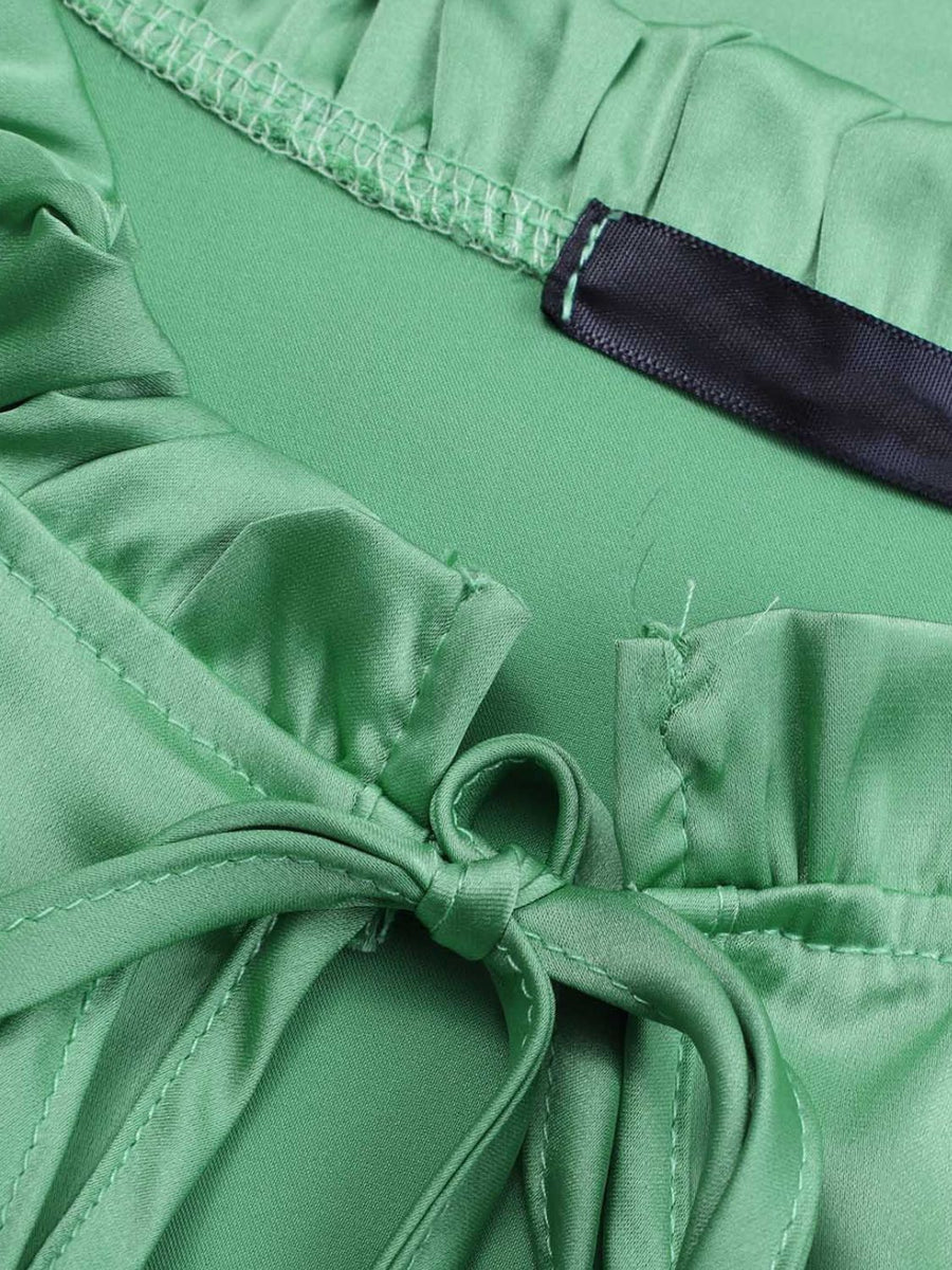 Gum Leaf green satin blouse with tie neck and shirred cuffs detail