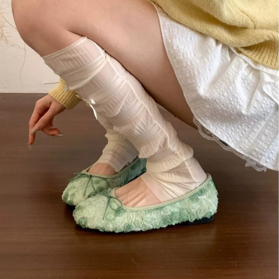 Green floral bow slip-on flats with 3D texture detail