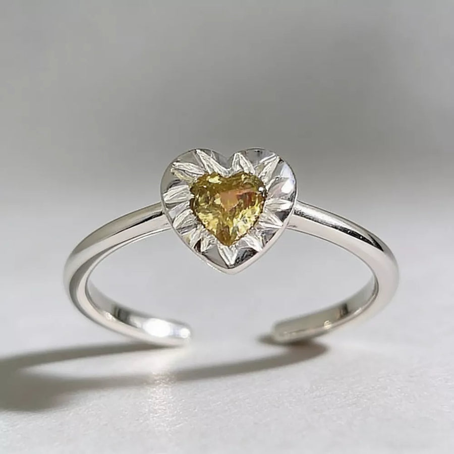 ring in yellow with heart-shaped and heart-shaped stone