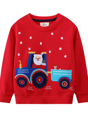 Red crew neck sweatshirt with Santa in a tractor applique and white polka dots.