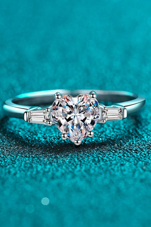 Silver ring with heart-cut moissanite and baguette stones