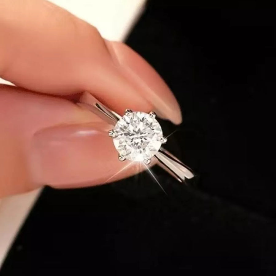 925 sterling silver,Moissanite Carat weight: 5ct Care instructions: Avoid wearin ring in clear with fitted silhouette