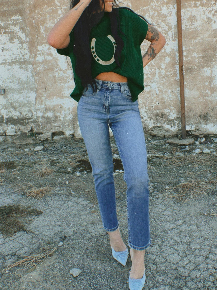 Green ribbed knit sweater with horseshoe graphic, crew neck, and short sleeves.