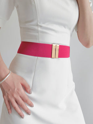 Wide elastic belt in Deep Rose with a gold double bar clasp.