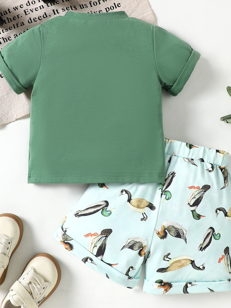 Baby green cotton blend graphic tee and duck print shorts set