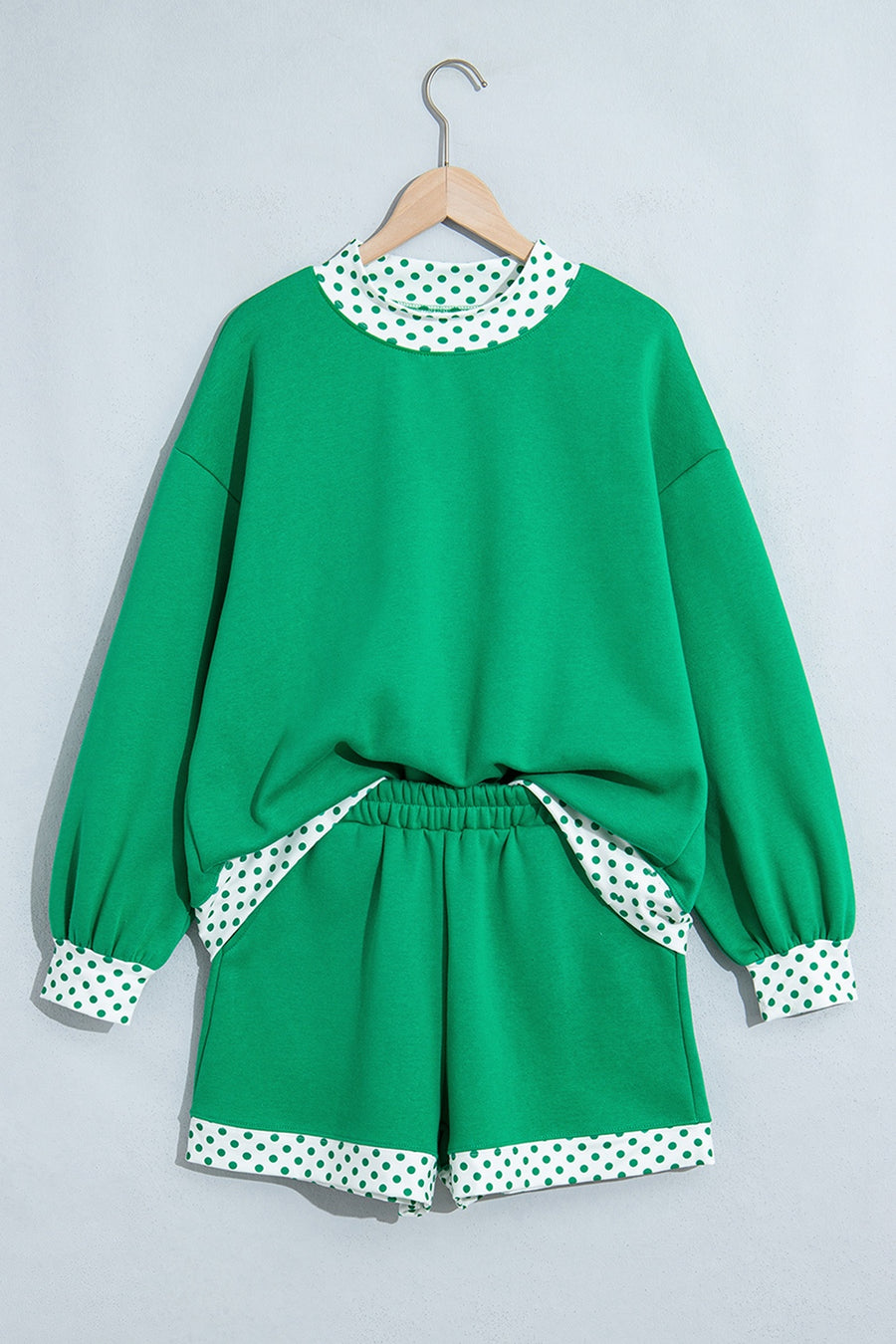 50% polyester, 50% cotton Care instructions: Machine wash cold lounge set in Green with relaxed silhouette