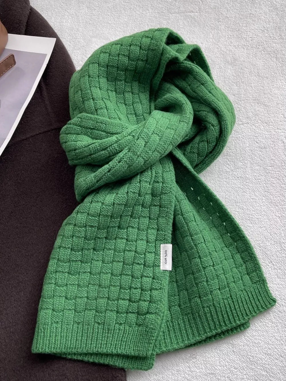 Luxurious dual knit wool scarf in dark green with basketweave pattern.
