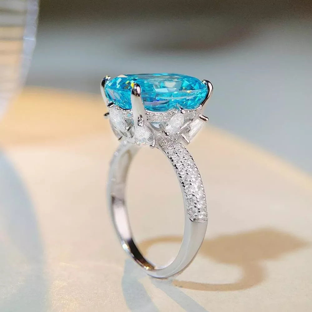 925 sterling silver, Zircon Care instructions: Avoid wearing during exercise, as ring in Pastel Blue with fitted silhouette