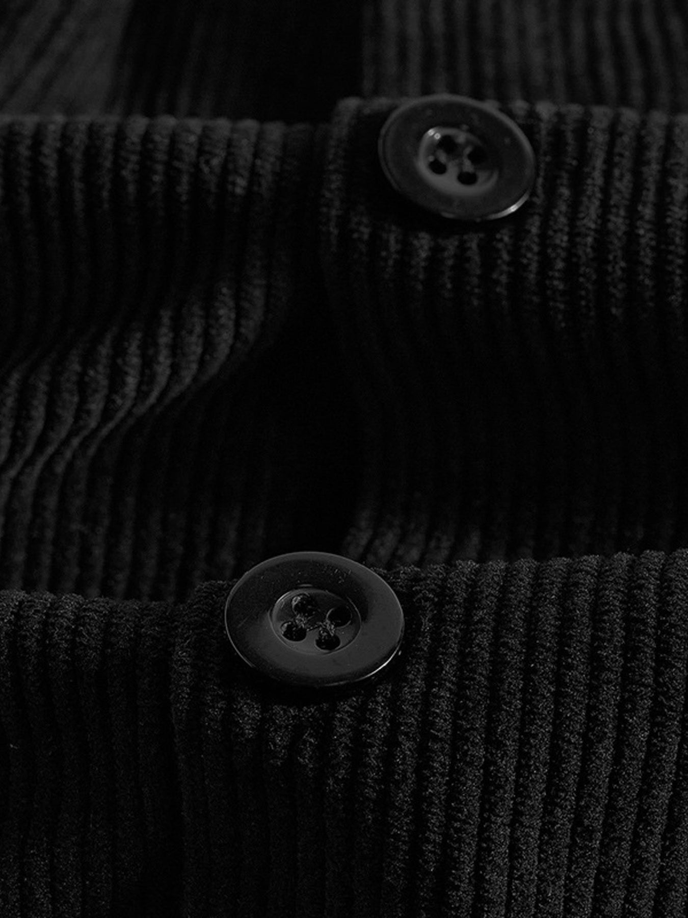 Black corduroy jacket with button closure