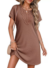 Brown waffle knit dress with lace neckline detail and short sleeves.