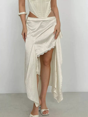 100% polyester Care instructions: Machine wash cold midi skirt in Apricot with flared silhouette