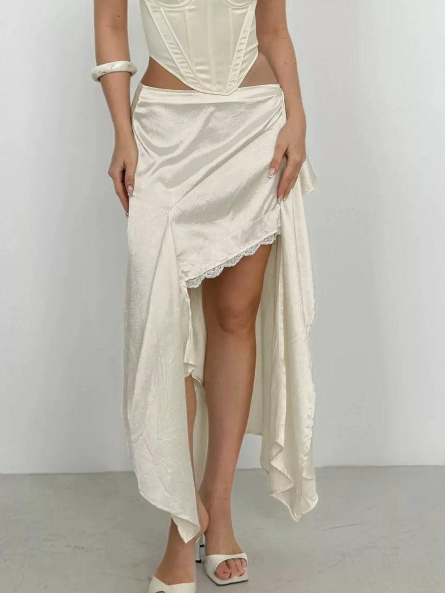 100% polyester Care instructions: Machine wash cold midi skirt in Apricot with flared silhouette