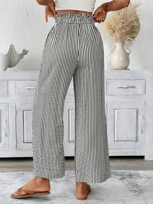 Striped paper bag maternity pants with a ruffled waist and wide leg