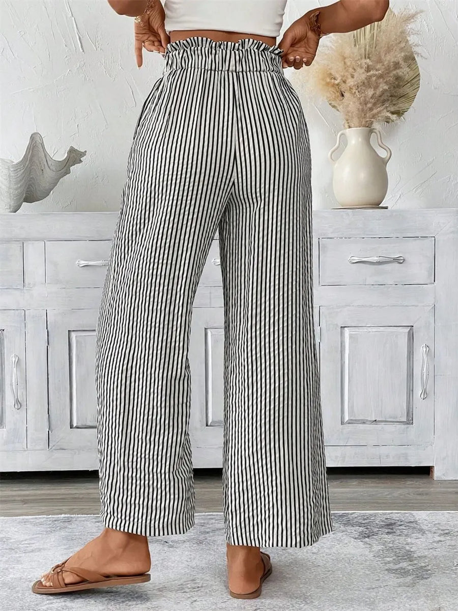 Striped paper bag maternity pants with a ruffled waist and wide leg