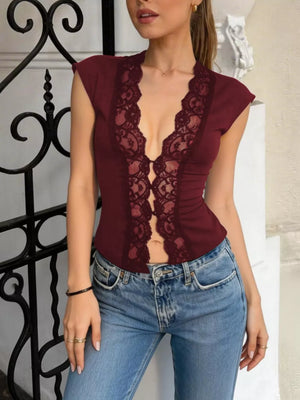Wine red sheer vest with lace trim and button details, cropped fit.