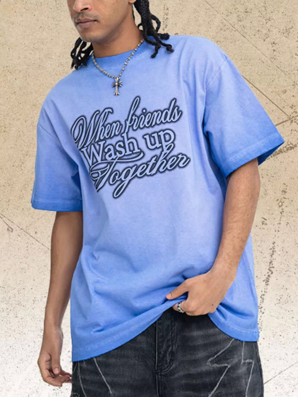 Men's blue vintage wash graphic tee with crew neck and "When friends wash up together" text.