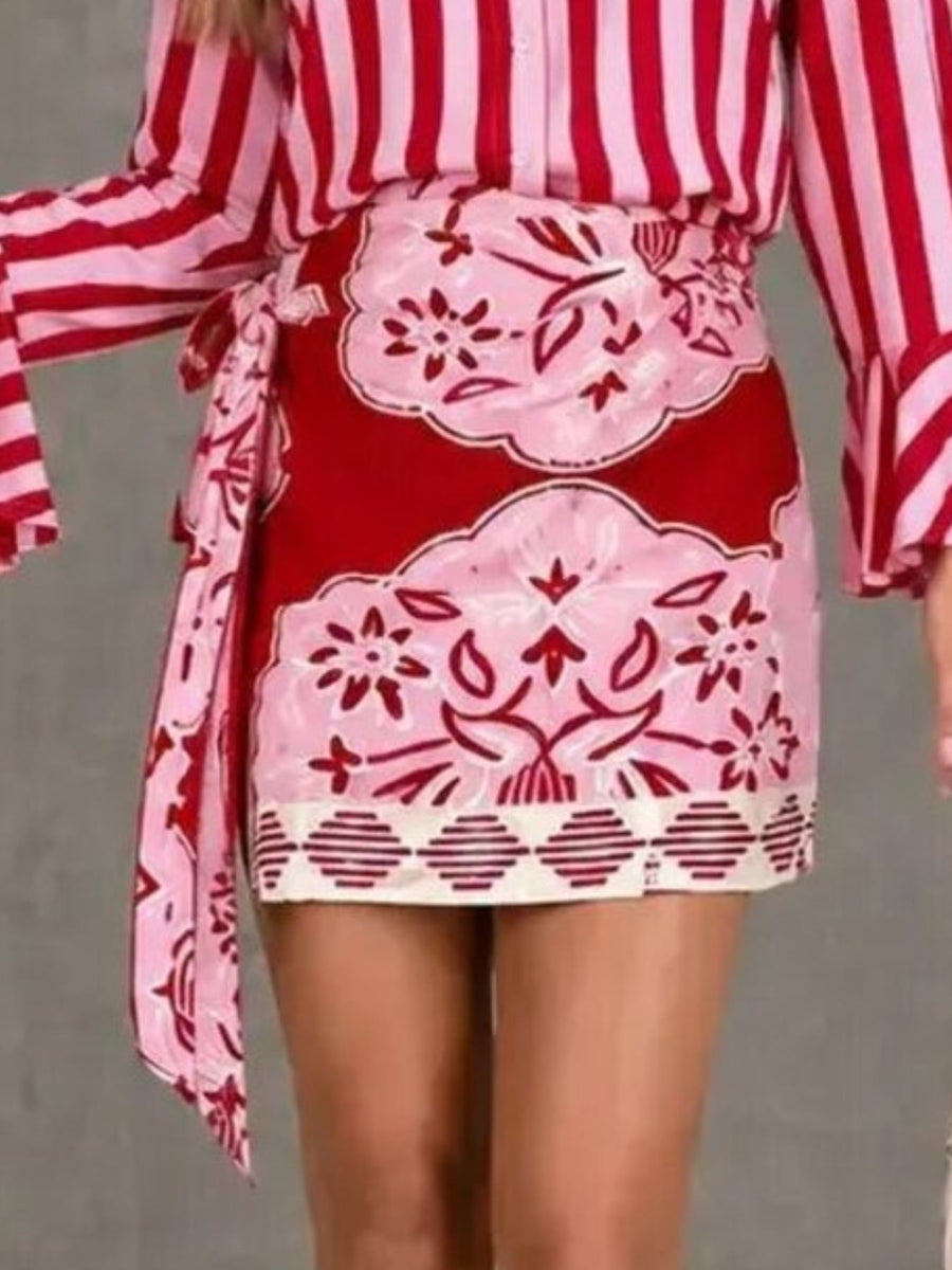 100% polyester Care instructions: Machine wash cold shirt and skirt set in Deep Rose with relaxed silhouette