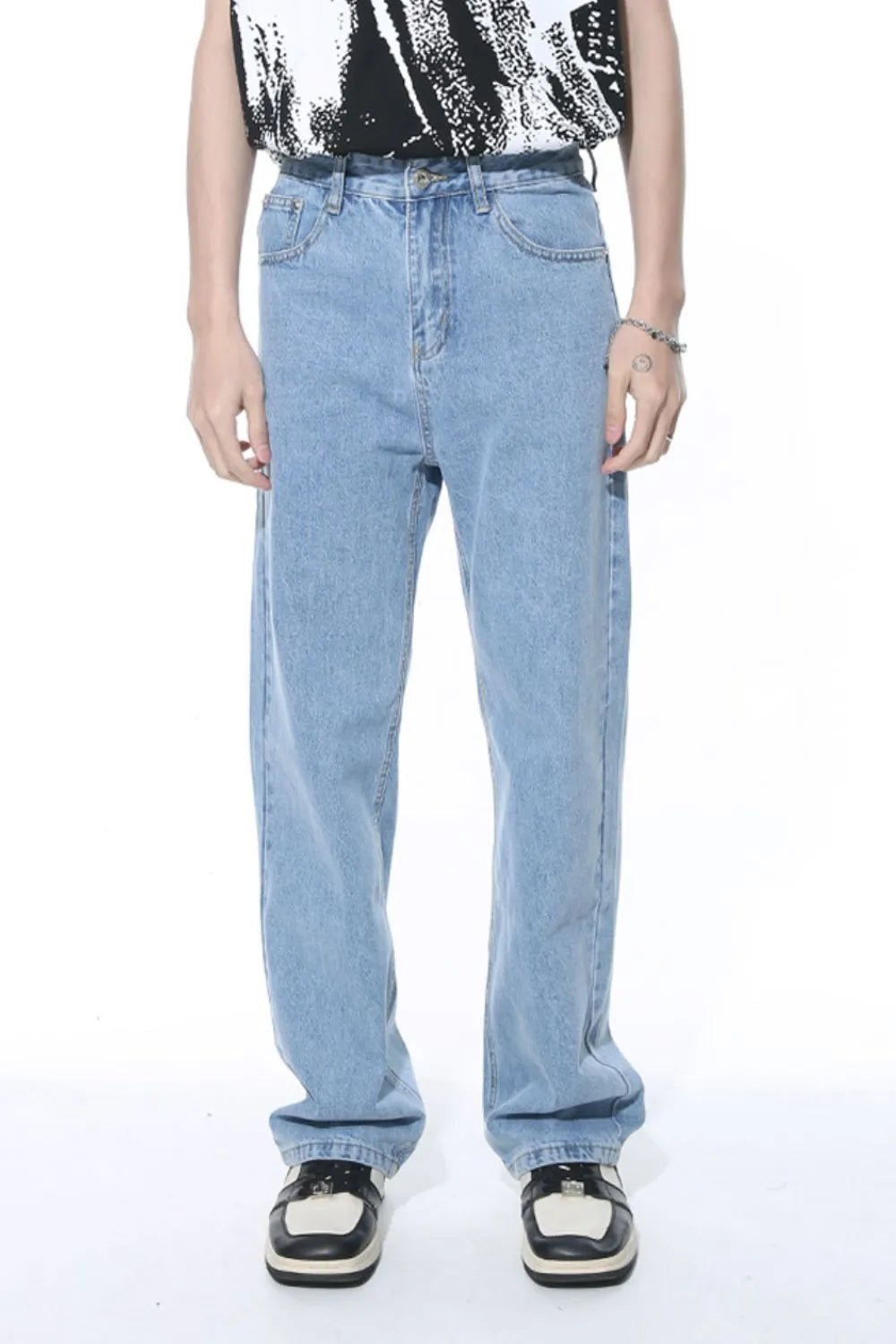 Relaxed fit light wash denim jeans with a straight leg cut.