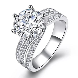 Dazzling 3 carat moissanite silver ring with brilliant accents and certificate.