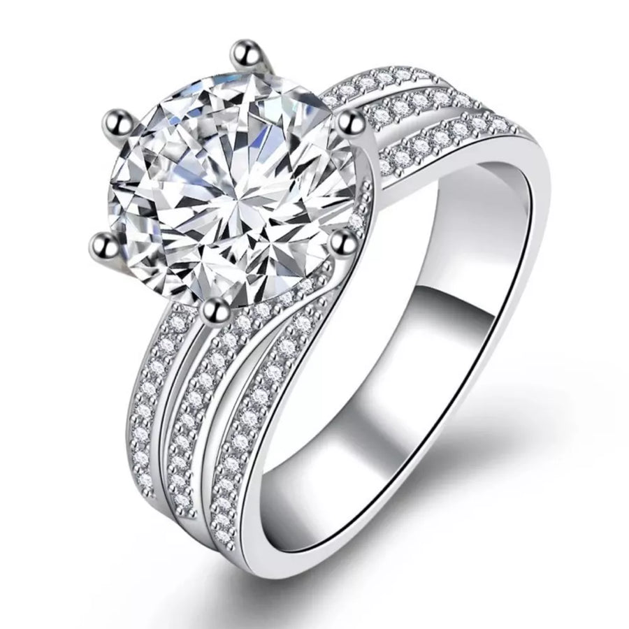 Dazzling 3 carat moissanite silver ring with brilliant accents and certificate.