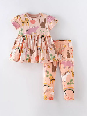 Toddler girls' pink dinosaur and rainbow print cotton outfit with puff sleeves and leggings.