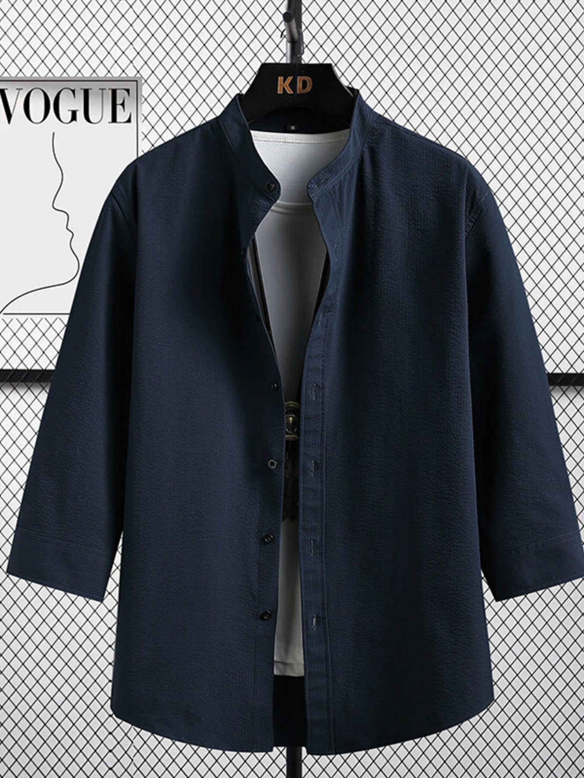 Navy textured band collar shirt with 3/4 sleeves and button front.