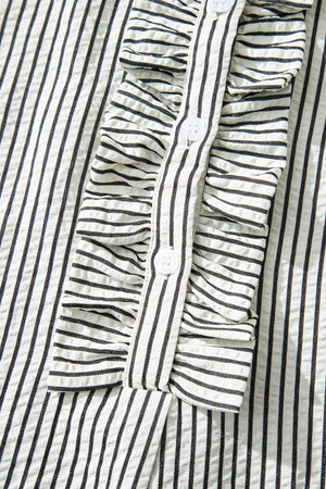 Chic striped ruffle maxi dress with button-down front and cap sleeves.