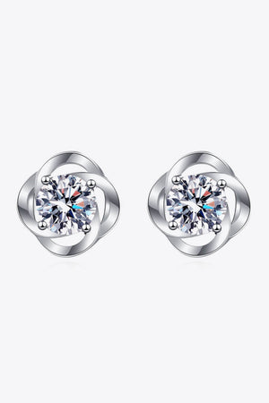 Silver four-leaf clover stud earrings with a central sparkling stone