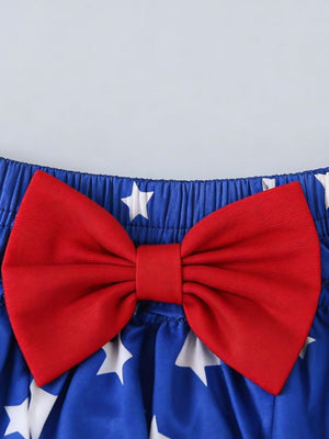 Children's royal blue star print bloomer shorts with red bow detail