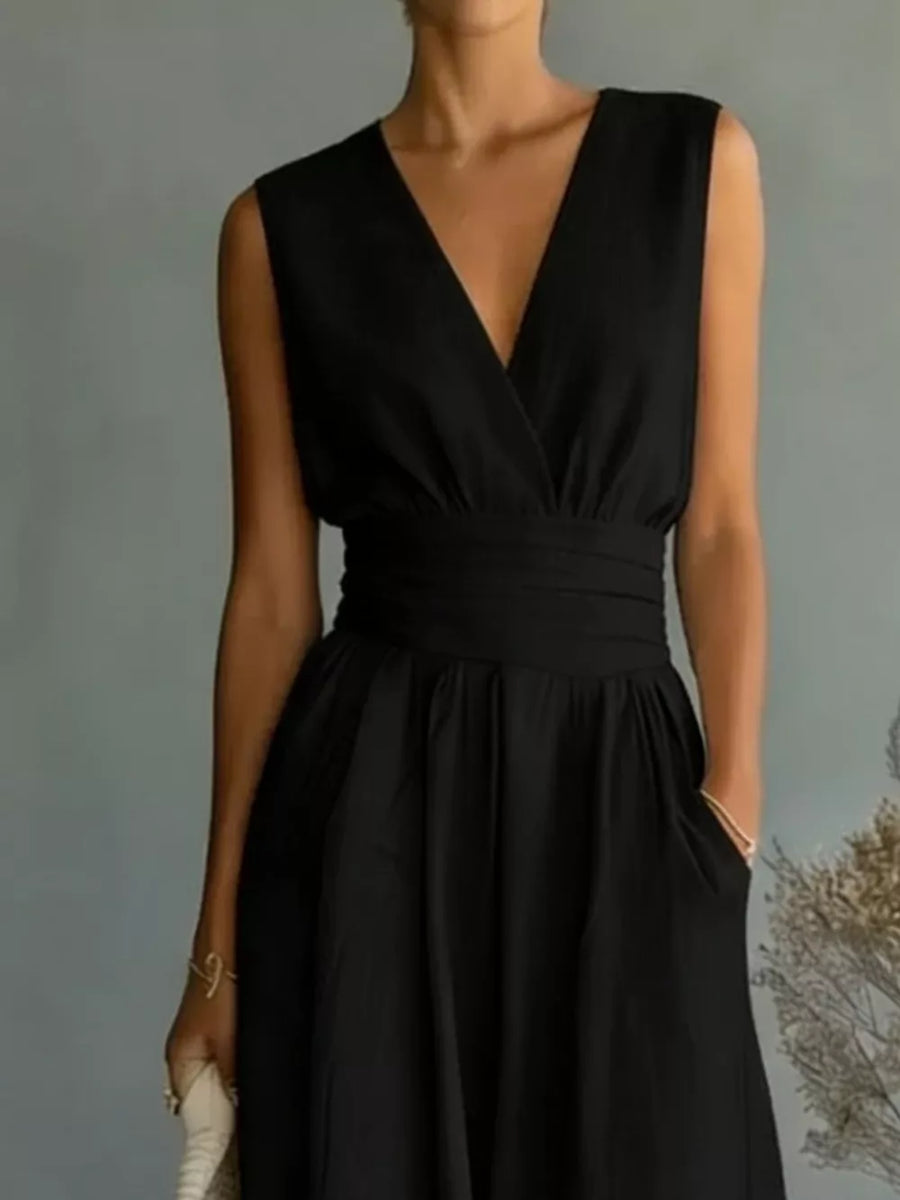 Black sleeveless wide-leg jumpsuit with V-neck, cinched waist, and pockets.
