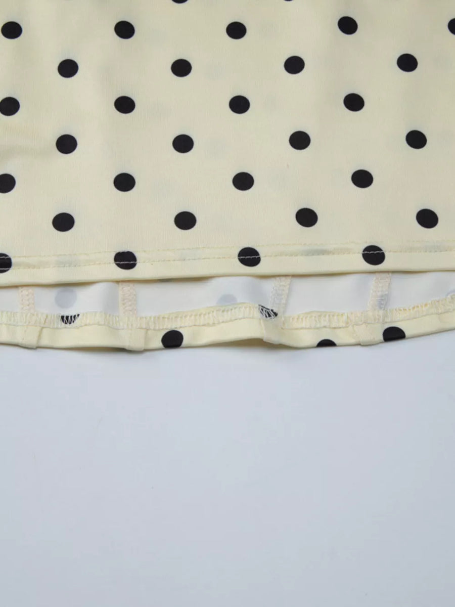 Pastel yellow polka dot tank top with sweetheart neckline detail