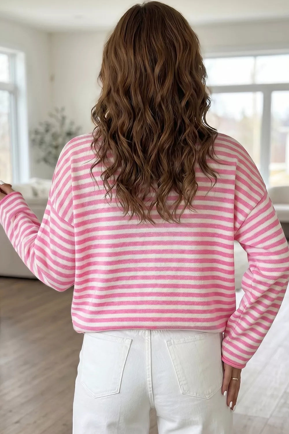 white pullover sweater featuring button placket and striped