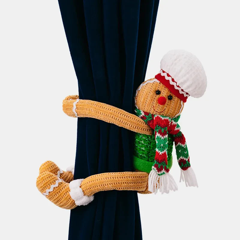 Gingerbread man curtain tieback with red and green scarf and white hat.