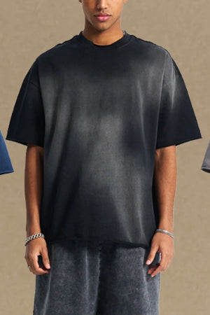 Black acid wash boxy tee with raw hem and crew neck.