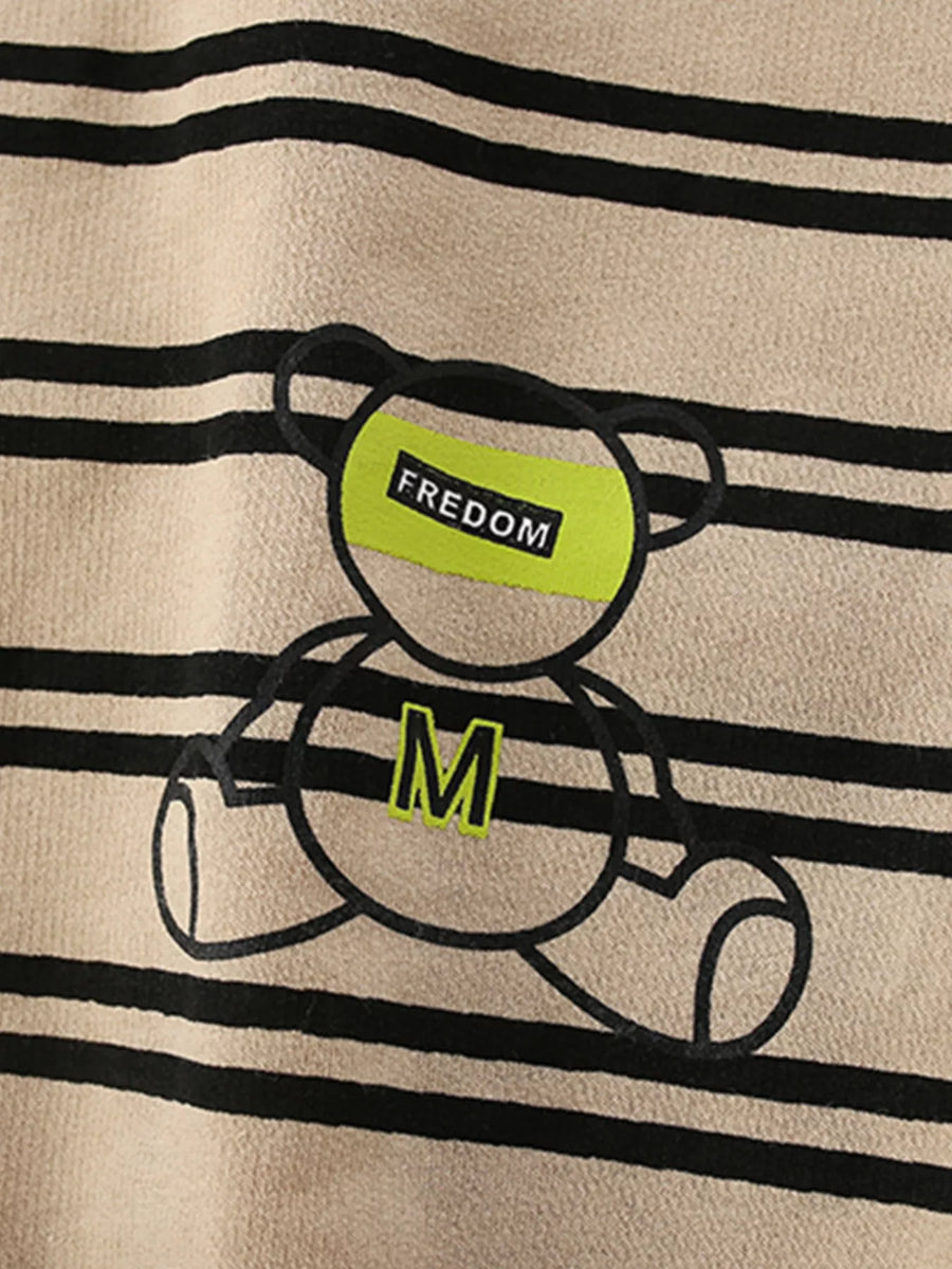 Tan striped cotton crew neck sweatshirt with a bear graphic and "FREEDOM" text detail.