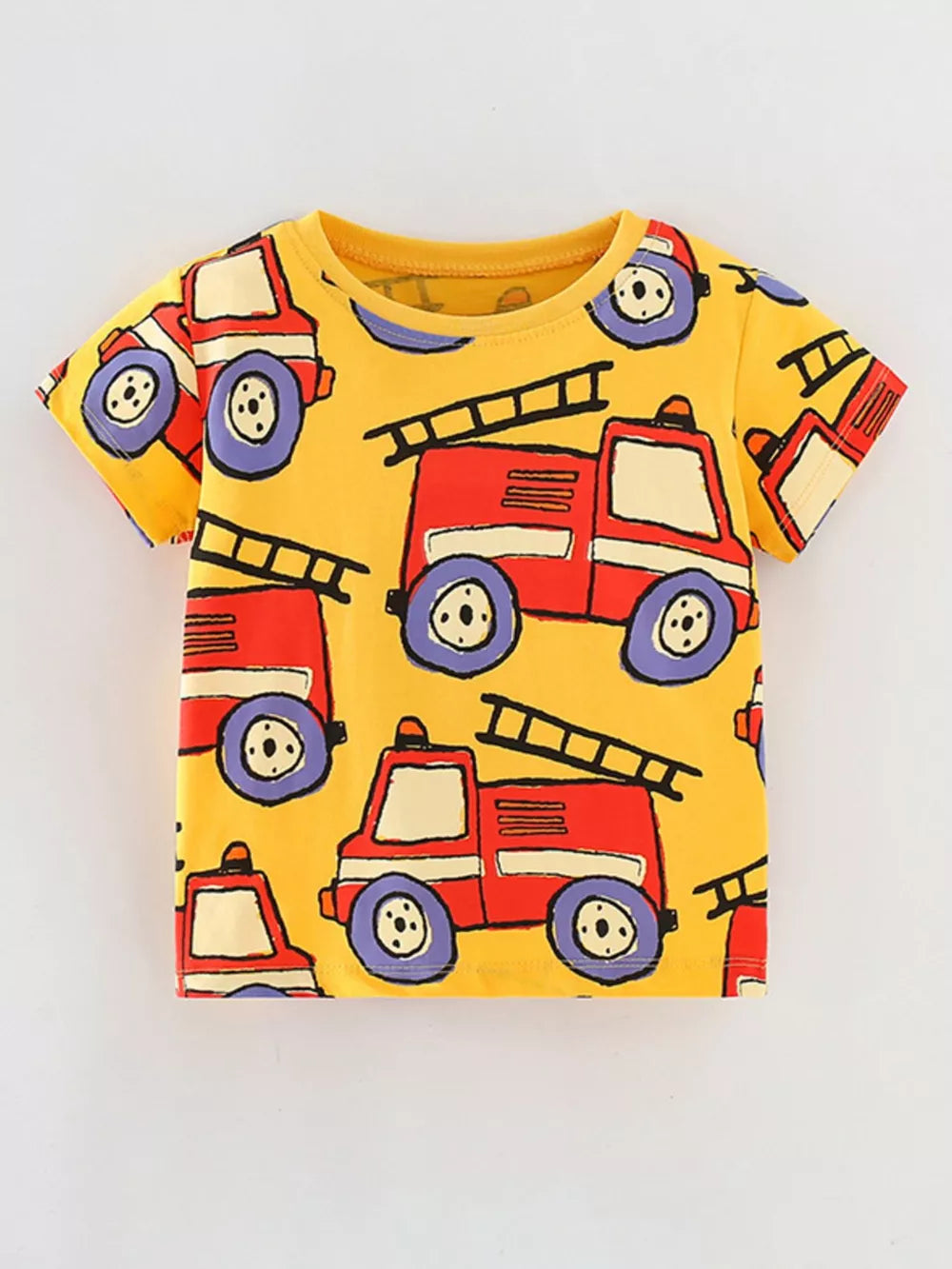 Yellow toddler t-shirt with all-over red fire truck print, short sleeves, and crew neck.