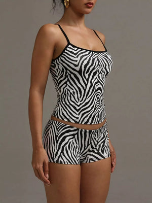 Women's zebra print cami and shorts pajama set with spaghetti straps.