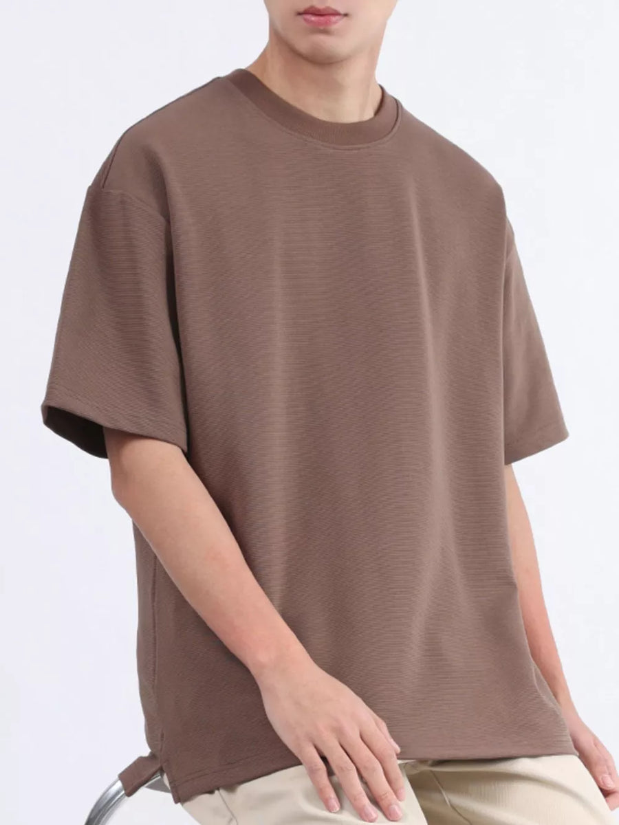 Men's brown textured cotton t-shirt with a round neck and short sleeves.