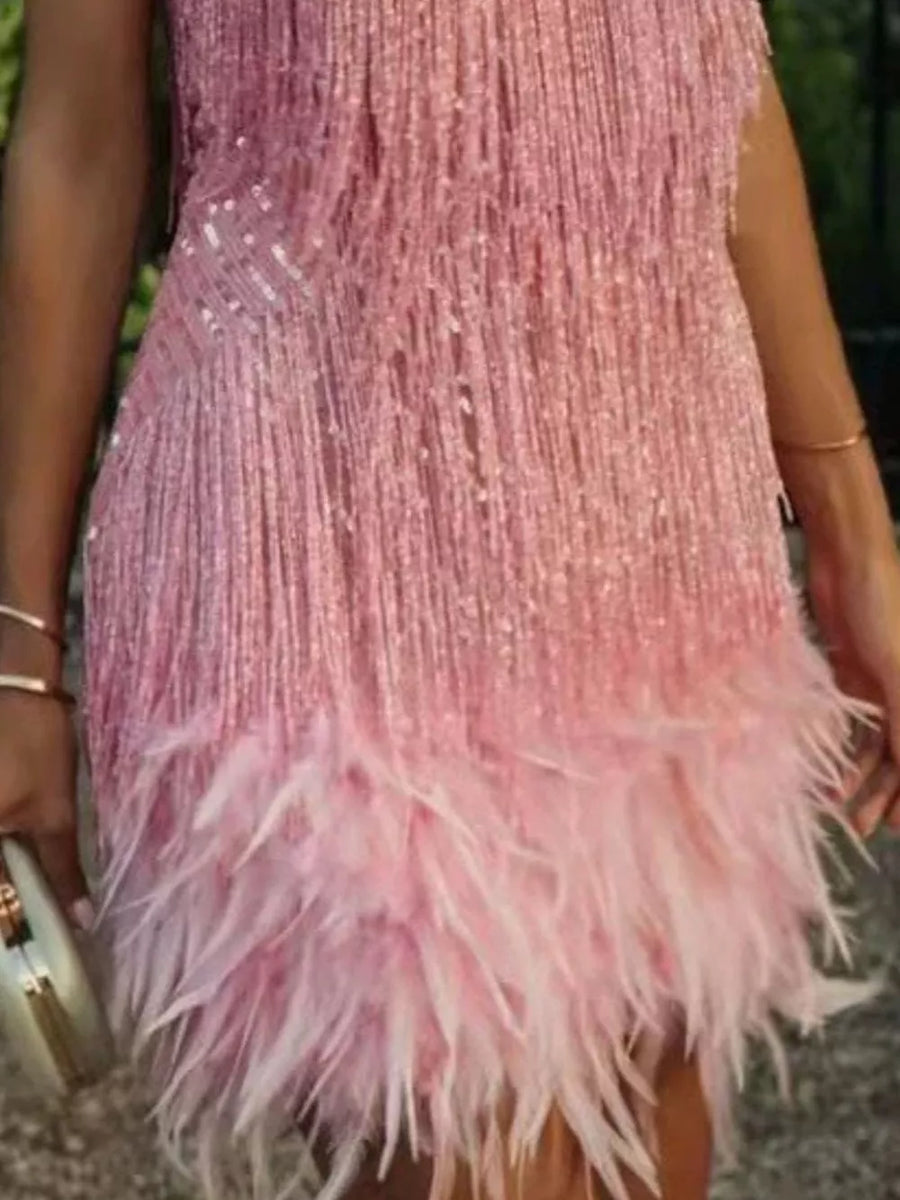Pink sequin fringe dress with feather trim hem.