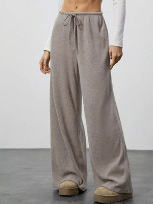 Mocha ribbed wide-leg pants with drawstring waist and relaxed fit.