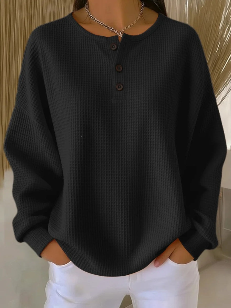 100% polyester Care instructions: Machine wash cold henley in Black with relaxed silhouette