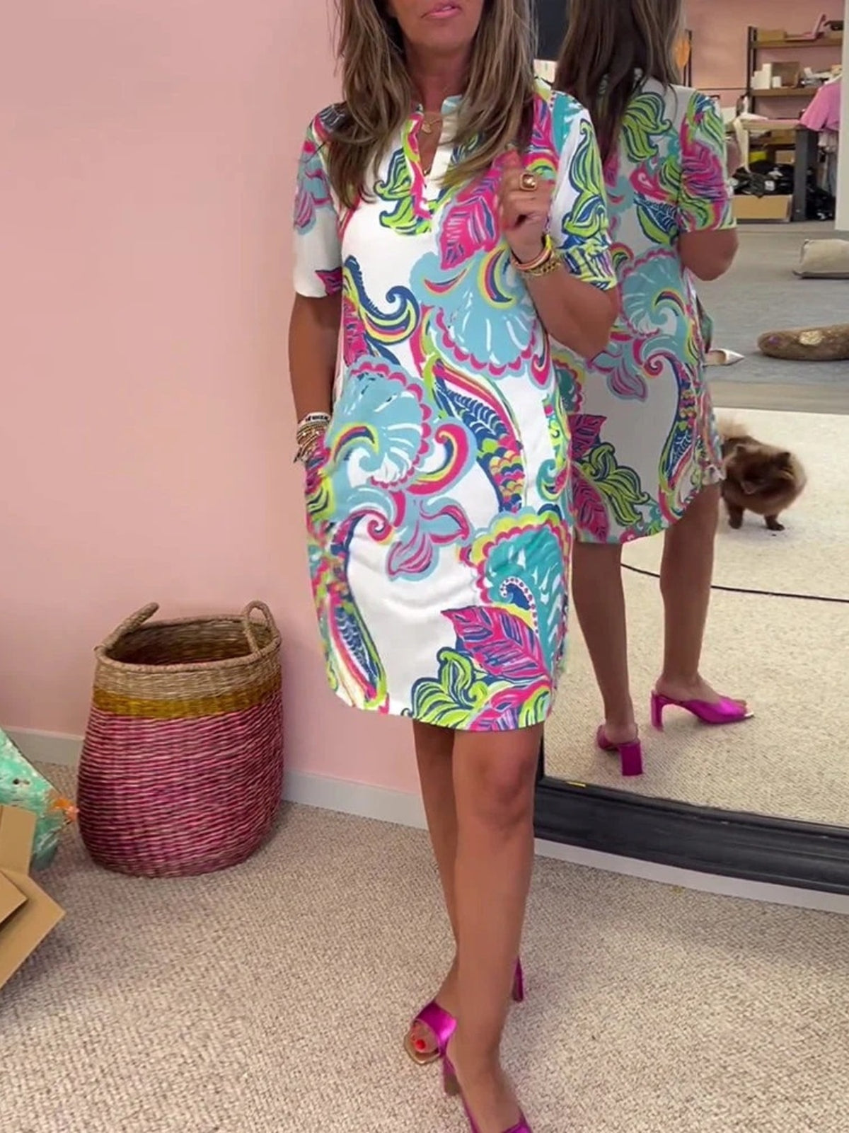white shift dress with paisley and v-neck